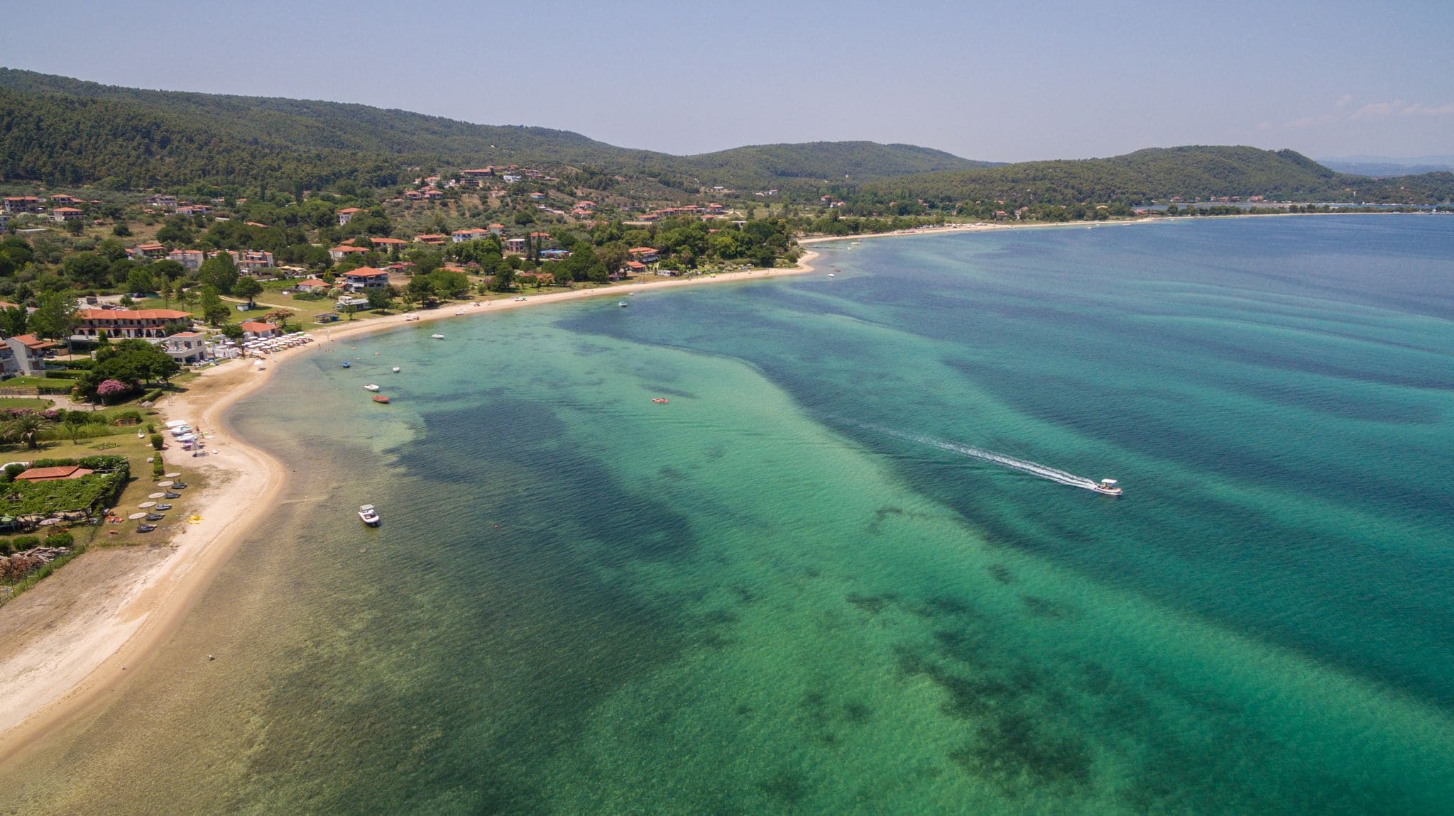 Shallow turquoise water along the Vourvourou beach, Sithonia
