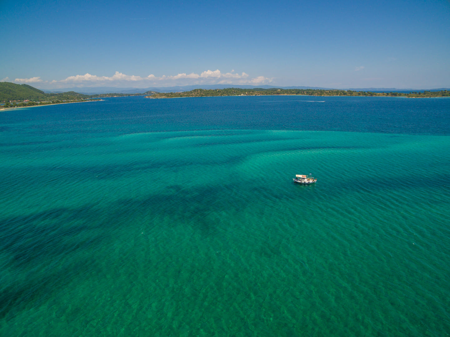Emerald sea between Vourvourou and the Diaporos islands