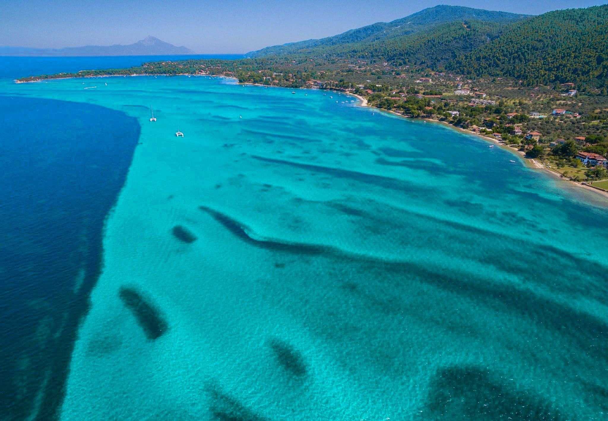 Long Vourvourou coastline and clear shallow sea, Halkidiki
