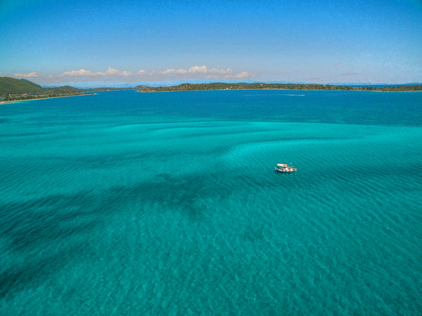 Emerald sea between Vourvourou and the Diaporos islands